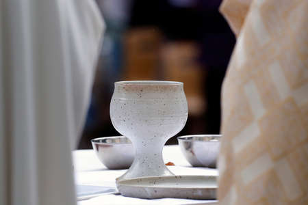 Sunday mass. Priest at eucharistic celebration.の写真素材