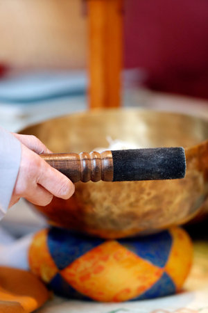 Buddhist ceremony. SInging bowl. Saint Pierre en Faucigny. France.
