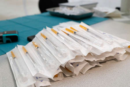 COVID-19 vaccination center. Syringes with corona serum. Moderna COVID-19 vaccines. Saint-Gervais. France.の写真素材