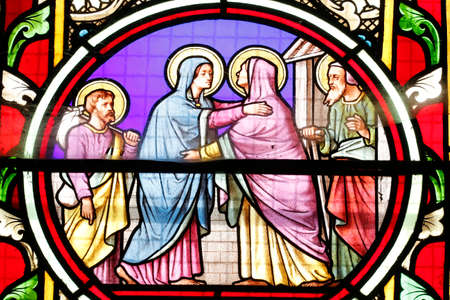 Sacre Coeur (sacred heart) of Castellane church. Stained glass window. The Visitation of the Blessed Virgin Mary is the visit of Mary with Elizabeth as recorded in the Gospel of Luke. The Visitation of the Blessed Virgin Mary is the visit of Mary with Eliのeditorial素材