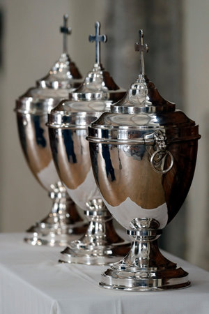 Saint Maurice church. Holy Thursday. Chrism Mass. Holy oils used in the sacraments. Sacred Chrism,...