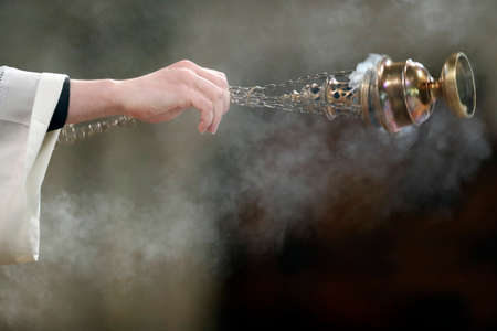 Saint Francois de Sales basilica. Thurifier swinging the thurible. Catholic mass. Thonon. France.の写真素材