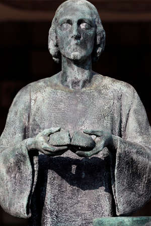 Monumental Cemetery. Campari tomb by Giannino Castiglioni The Last Supper, Jesus breaking bread. Bronze. Milan. Italy.の写真素材