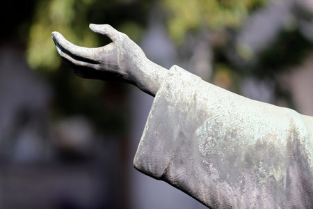Monumental Cemetery. Saint Francis of Assis. Bronze sculpture. Milan. Italy.