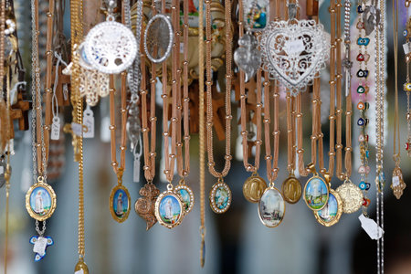 Sanctuary of Fatima. Souvenir shop with Rosary beads and religious medals. Portugal.