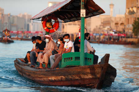 Water taxi boat called abras on Dubai Creek. Dubai. United Arab Emirates.のeditorial素材