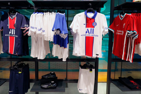 Dubai Mall, the largest shopping mall in the world with 1200 shops, part of the Burj Khalifa complex. Nike sportswear store. Soccer shirts. Dubai. United Arab Emirates.のeditorial素材