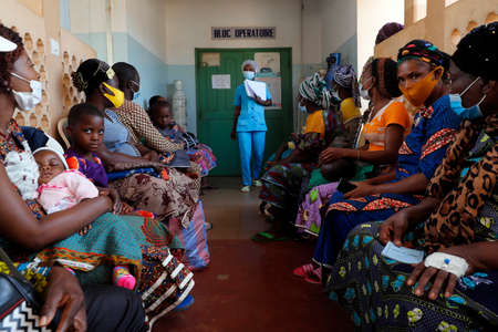 African hospital. Pediatric unit. Medical consultation. Waiting room. Benign.のeditorial素材