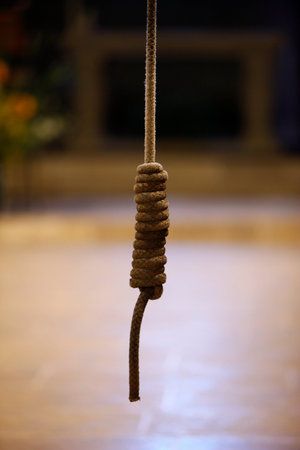 Ganagobie monastery church. Rope for prayer call. France.