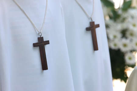 Altar boys during a catholic mass. France.の写真素材