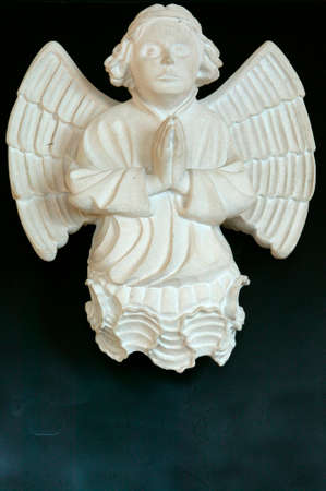 Batalha monastery. Angel praying statue. Portugal.の写真素材