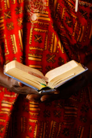 African man reading the Bible. Togo.の写真素材
