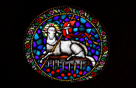A stained glass window of Christ the Lamb in St Matthias church, Budapest. Hungary.のeditorial素材