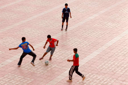 Boys playing football. Outdoor sports. Morocco.のeditorial素材