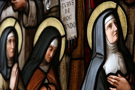Holy Sacrament church. Stained glass window. Catholic nuns. France.のeditorial素材