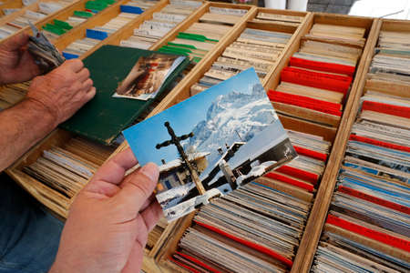 Old church postcard on a market. France.のeditorial素材
