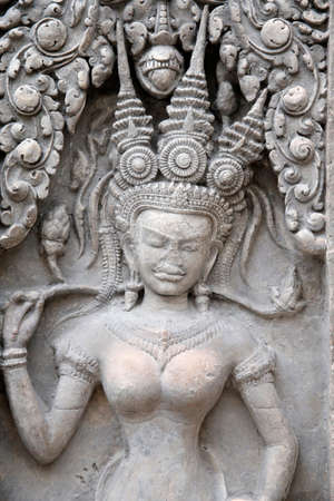 Apsara. Cast of Angkor Wat western entrances central tower's gate. Musのeditorial素材