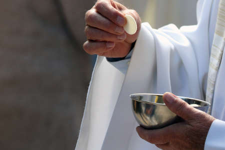 Sanctuary of La Benite Fontaine. Catholic mass. holy communion. La Roche-sur-Foron. France.の写真素材
