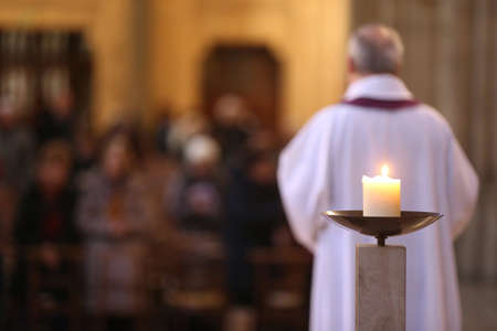 Catholic mass. Priest. Catholic church. France.のeditorial素材