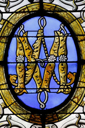 Saint-Sulpice church. Marian monogram. Catholic church. France.のeditorial素材