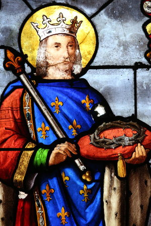 Saint-Fargeau church. Stained glass window. Louis IX of France with crown of thorns. France.のeditorial素材