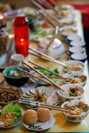 Chua Tu An Buddhist temple. Ancestor altar. Vegetarian offerings. Saint-Pierre in Faucigny. France.のeditorial素材