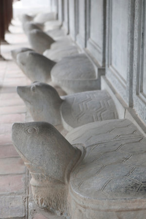 The Temple of Literature is Confucian temple which was formerly a center of learning in Hanoi. Stelae of doctors riding the backs of turtles. Ha Noi. Vietnam.のeditorial素材