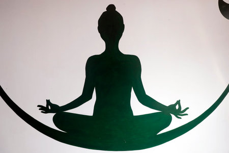 Yoga painting on a wall. Ho Chi Minh City. Vietnam.のeditorial素材