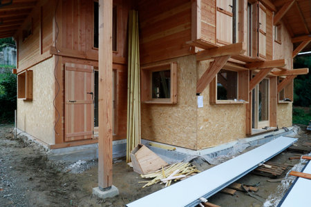 Wooden structure of house under construction.のeditorial素材