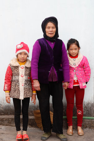 Vietnamese grandmother with granddaughters. Lang Son. Vietnam.のeditorial素材