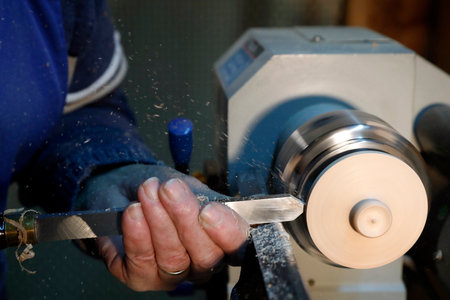 Man working on a wood lathe.のeditorial素材