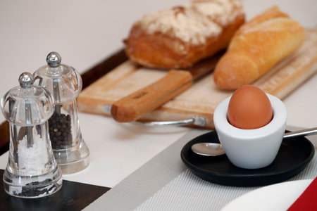 Breakfast on a table at a hotel. Egg and bred.のeditorial素材