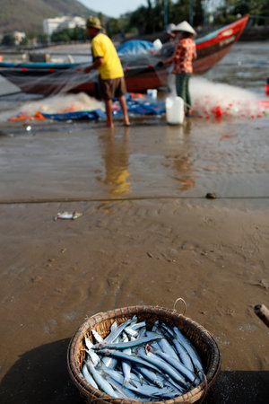 Fishermen preparing fishing net. Vung Tau. Vietnam.のeditorial素材