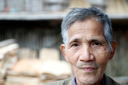 Old vietnamese man. Portrait. Bac Sound. Vietnam.のeditorial素材