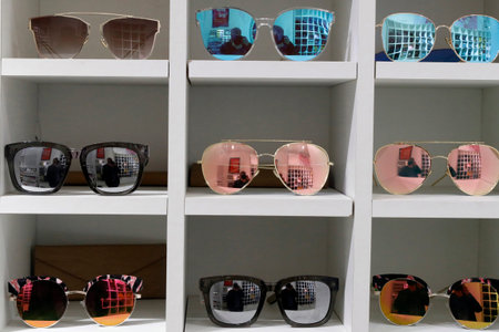 Sunglasses on sale display shelf in sunglasses shop. Ha Noi. Vietnam.
