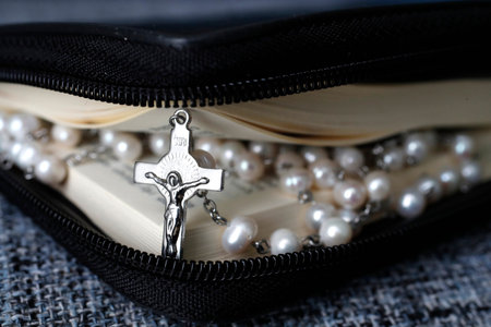 Catholic bible with a rosary. Religious church.