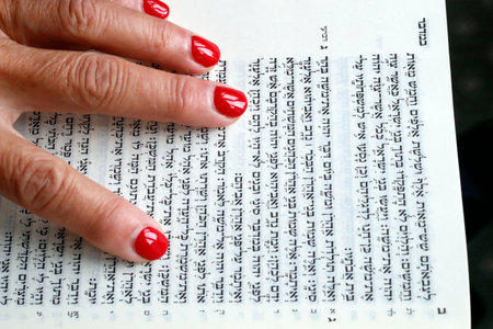 Jewish woman reading the Torah. Close-up.の写真素材