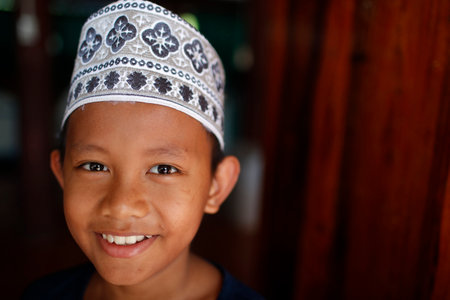 Jamiul Azhar mosque. Muslim boy at a Madrassa school. Chau Doc. Vietnam.のeditorial素材