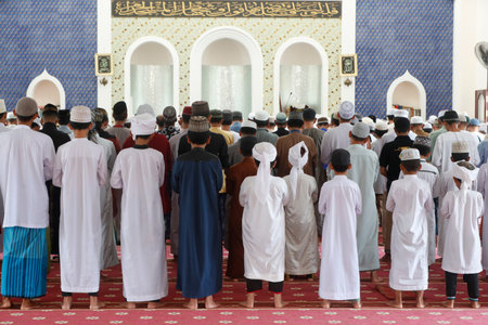 Masjid Ar-Rohmah mosque. Men at the friday prayer (salat). Chau Doc. Vietnam.のeditorial素材