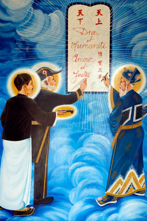 Cao Dai temple. Mural of Dr Sun Yatsen, Victor Hugo and Nguyen Binh Khiem: the tree Saints. Ha Tien. Vietnam.のeditorial素材