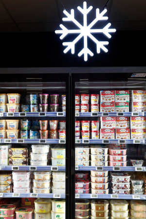 Stalls in row at supermarket. Frozen processed foods. France.のeditorial素材