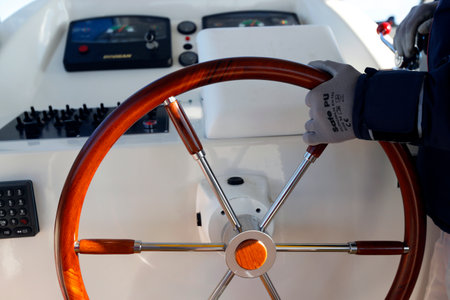 Vaporetto water bus. Captain and boat wheel. Venice. Italy.のeditorial素材
