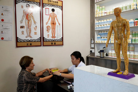 Traditional Chinese Pharmacy. Chinese medicine practitioner. Singapore.のeditorial素材