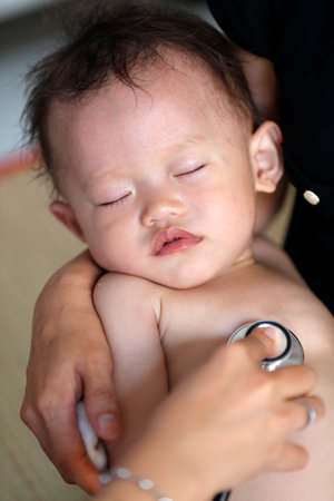 French NGO Chaine de lâEspoir. Children's pavilion. Child suffering from heart disease. Ho chi Minh city. Vietnam.のeditorial素材
