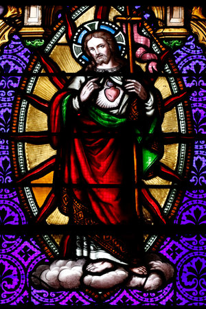 Saint Peter Cathedral. Jesus sacred heart. Stained glass window. Annecy. France.のeditorial素材