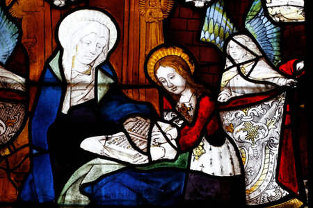 St Peter church. Saint Anne teaching Mary. Stained glass window. Dreux. France.