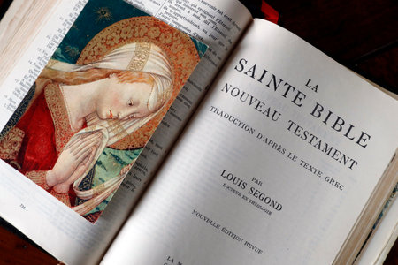 Open old bible. Religious image of the Holy Virgin. France.のeditorial素材
