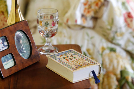 Torah on the bedside table in the interior of bedroom. France.のeditorial素材