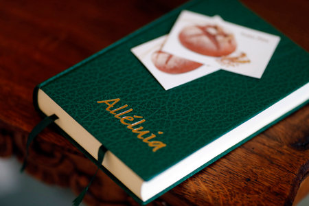 Alleluia, a Protestant Praise and Worship Songbook, on the bedside table in the interior of bedroom. France.のeditorial素材