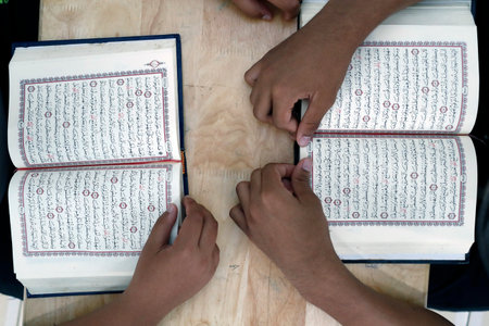Muslim children learning Quran at Islamic school.のeditorial素材